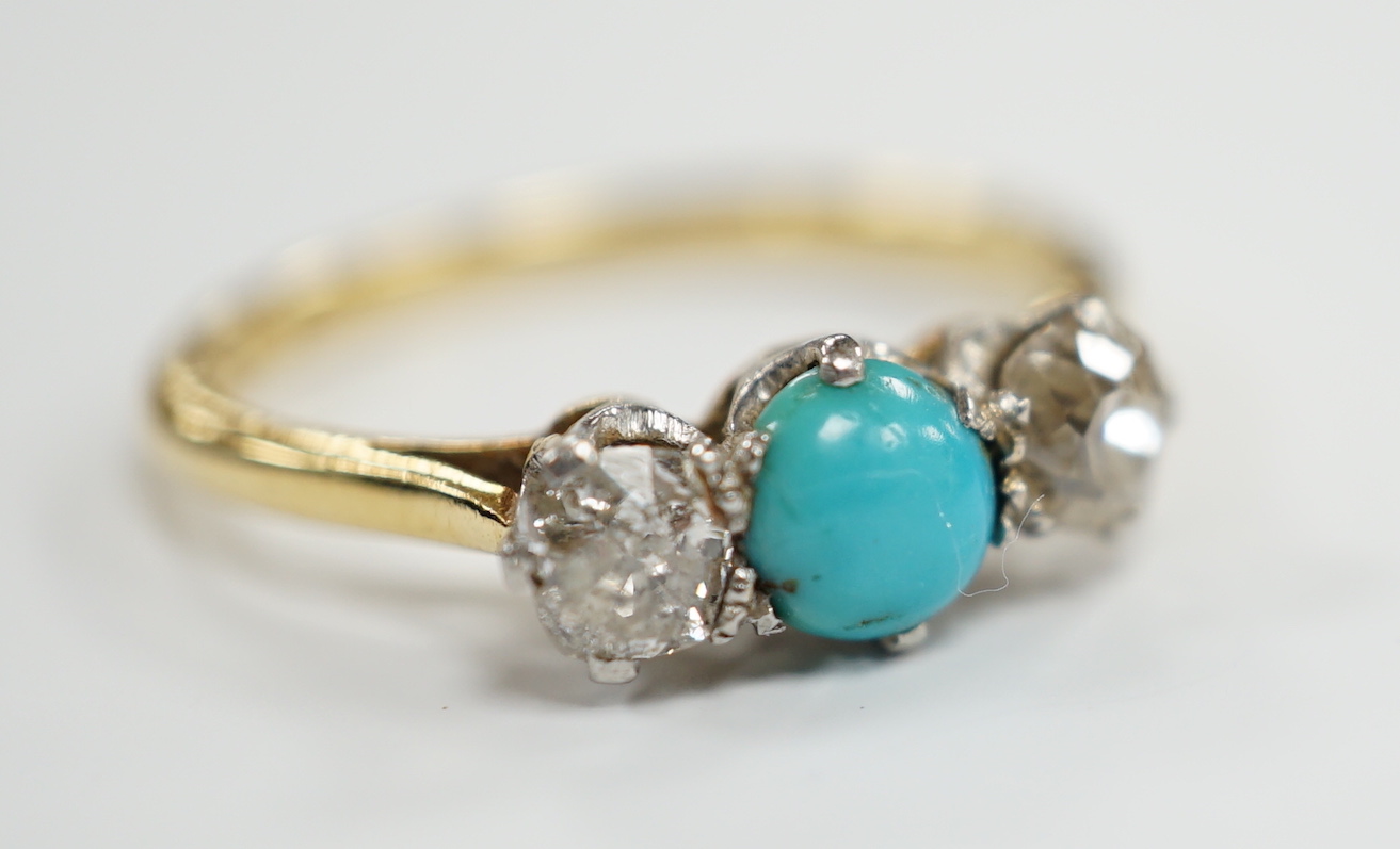 An 18ct, single stone turquoise and two stone diamond set ring, size O, gross weight 2.9 grams.